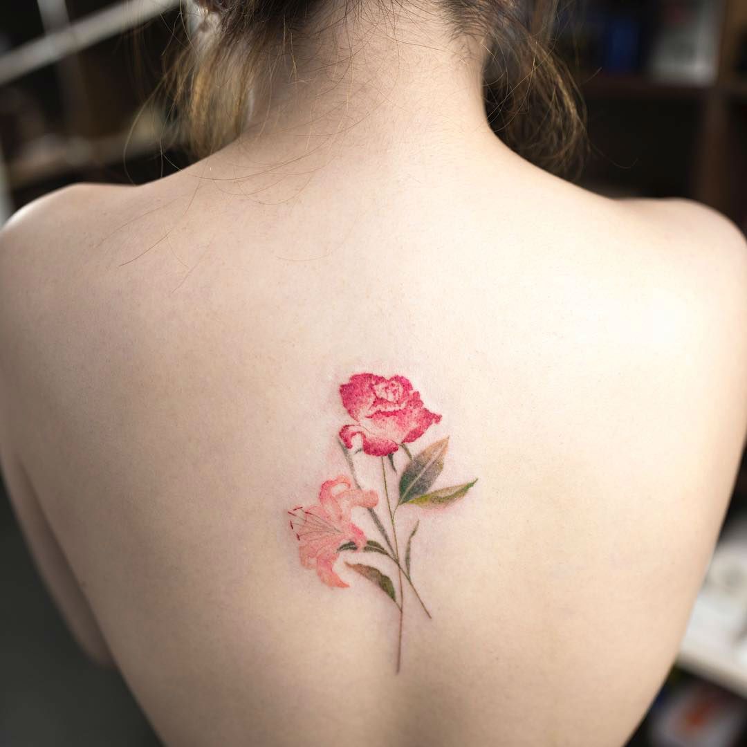 Flower Watercolor Tattoo.